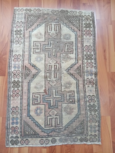 Damaged muted rug handmade old - damaged,